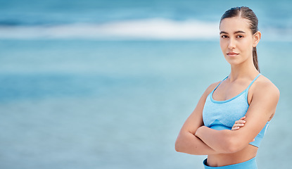 Image showing Fitness, yoga and portrait of woman by beach with mockup space for wellness, healthy body and energy. Sports, nature and female person with crossed arms for exercise, training and workout by sea