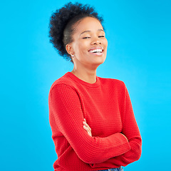 Image showing Laughing, smile and portrait of a woman with style and confident isolated in a studio blue background. Casual, outfit and full body of a happy young female person with stylish or trendy clothes