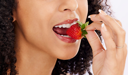 Image showing Healthy, eating or mouth of woman with strawberry in studio on white background for clean diet nutrition. Hand, bite closeup or girl model with beauty or natural fruits for nutrition or wellness