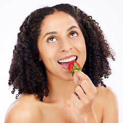 Image showing Healthy, eating or happy woman with strawberry in studio on white background for clean diet nutrition. Smile, looking up or girl model thinking of beauty or natural fruits for nutrition or wellness