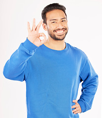 Image showing Okay hands, portrait and asian man in studio, isolated white background and vote of good review. Male model, smile and ok for success, agreement and icon for support, yes emoji and thank you sign