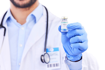 Image showing Monkeypox vaccine, medicine bottle and doctor hands with vial for healthcare, safety and immunity in studio. Closeup, medical worker and vaccination for virus, development or risk on white background