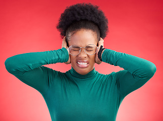 Image showing Stress, headache and hands on ears of black woman in studio with noise, complaint or frustration on red background. Migraine, anxiety and African female with vertigo, brain fog or hearing loss crisis