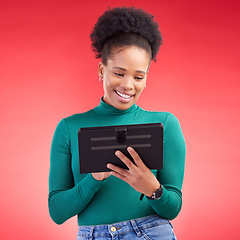 Image showing Happy woman, tablet and research for social media or communication against a red studio background. African female person on technology for online browsing, networking or streaming entertainment