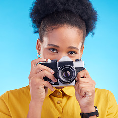 Image showing Photographer, portrait and camera, black woman isolated on blue background, creative artist job talent. Art, face of happy girl in photography hobby or career in studio on travel holiday photoshoot.