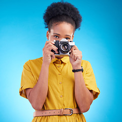 Image showing Photography, portrait and black woman with camera isolated on blue background, creative artist job talent. Art, face of happy photographer with hobby or career in studio on travel holiday photoshoot.