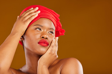 Image showing Beauty, makeup and space with face of black woman in studio for mockup, creative and pride. Skincare, salon and natural with female model on brown background for wellness, self care and glow