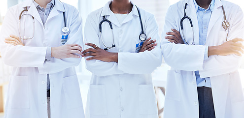 Image showing Doctors, collaboration and arms crossed with health, medical group and cardiology and surgeon team in hospital. Confidence, solidarity in cardiovascular healthcare and professional people in medicine