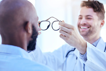 Image showing Glasses, optometrist and patient with men in clinic, vision and prescription lens with frame, choice and test. Eyesight, eye care and optometry, health and male people with decision for spectacles