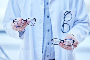 Image showing Glasses, choice and optometrist, hands and vision with eyewear in clinic, prescription lens with designer frame. Eyesight, eye care and optometry, healthcare and person with decision for spectacles