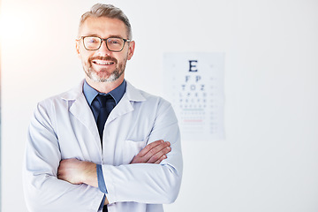 Image showing Senior man, optometrist and portrait, arms crossed and smile, eye care clinic and healthcare with vision. Male person, ophthalmology and health for eyes, eyesight assessment and prescription glasses