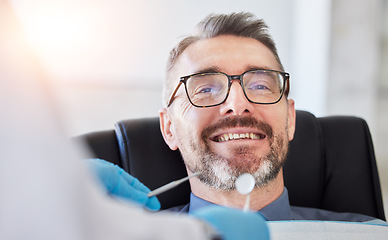 Image showing Senior man, smile and teeth, dentist and metal tools with health consultation, dental and oral care at clinic. Orthodontist, healthcare and medical check, gingivitis and cleaning mouth with wellness