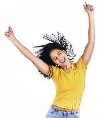 Image showing Excited, dancing and a woman in studio with happy energy for motivation or celebration. Winner, fun and a young person isolated on a white background moving to relax or cheer for freedom or success