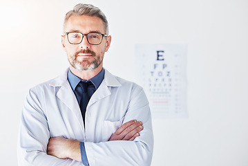 Image showing Senior man, arms crossed with optometrist in portrait, vision and glasses, eye care clinic and healthcare. Male person, ophthalmology and health for eyes, eyesight assessment and prescription lens