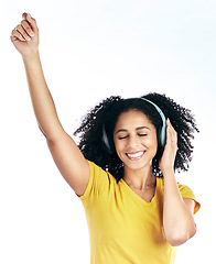 Image showing Dance, music and a woman with headphones in studio streaming audio, sound or radio. Energy, happy and a young african person isolated on a white background listening and moving to fun song to relax