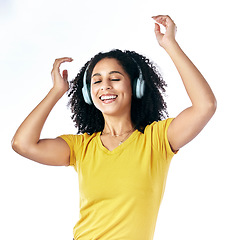 Image showing Music, dancing and a woman with headphones in studio streaming audio, sound or radio. Energy, happy and a young female person isolated on a white background listening and moving to fun song to relax