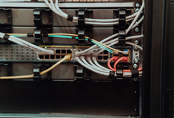 Image showing Close up of technician setting up network in server room