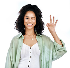 Image showing Studio, wink and woman portrait with perfect hand sign for support or agree, vote or review on white background. Face, smile and emoji yes by lady with ok, approval or like, thank you or feedback