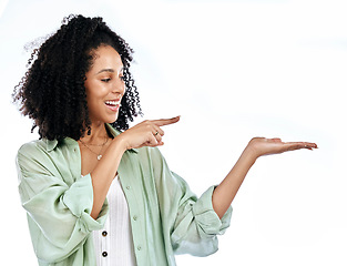 Image showing Pointing, announcement or happy woman with sale, retail offer or discount deal isolated in studio. Hand, advertising or excited girl showing mockup space, news or menu promotion on white background