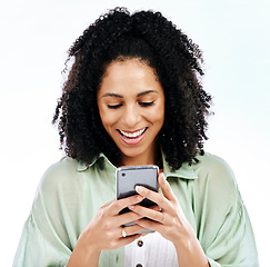 Image showing Phone, meme or happy woman texting for gossip or fake news isolated on a white background in studio. Smile, blog search or female person reading post on social media or typing a message on mobile app