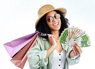 Image showing Happy woman, shopping and money in studio for cashback, award or giveaway on white background. Cash, winner and female customer with sale, payment or retail, competition or prize of financial freedom