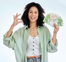 Image showing Woman, ok sign and money in studio portrait for prize, profit or win with investing, savings or notes by white background. Isolated African girl, excited student and cash with icon, gambling or lotto