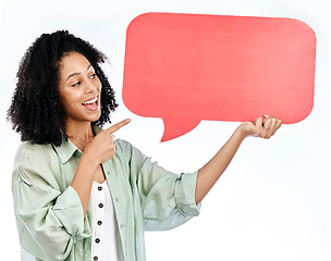 Image showing Woman, smile and hand pointing to speech bubble in studio for social media, contact or info on white background. Happy, lady and show poster for voice, feedback or FAQ, forum or conversation quote