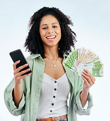 Image showing Woman, phone and cash in studio portrait with smile for prize, investment or excited by white background. Isolated African girl, smartphone and winner with money fan, success or profit on fintech app