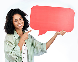 Image showing Woman, studio portrait and point at speech bubble with smile for promo, mockup or space by white background. Isolated African girl, happy student and sign for poster, paper billboard or social media