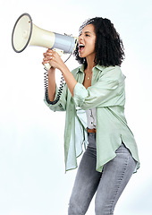 Image showing Woman, megaphone and angry protest in studio with shouting, noise and politics by white background. Isolated African girl, student and audio tech for justice, speech and change in human rights goals