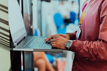 Image showing Close up of business hands are typing on laptop.