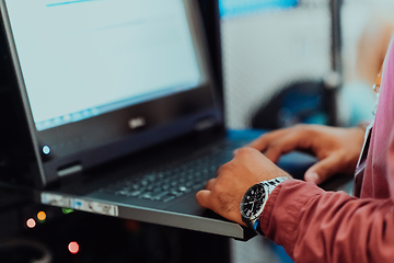 Image showing Close up of business hands are typing on laptop.