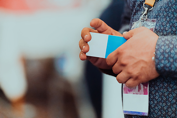 Image showing Businessmen Exchange Business Cards