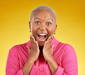 Image showing Wow, happy and portrait of black woman in studio with sale, deal or sign up promotion on yellow background. Open mouth, emoji and hands on African lady winner face for competition, prize or giveaway