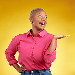 Image showing Hand, smile and black woman in studio with sale, news or promotion on yellow background. Happy, deal and African lady show competition, giveaway or contact, info and sign up, platform or how to steps