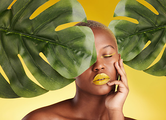 Image showing Calm black woman, makeup and leaves in skincare for natural beauty or cosmetics against a yellow studio background. Face of African female person in relax for facial treatment, lipstick or product