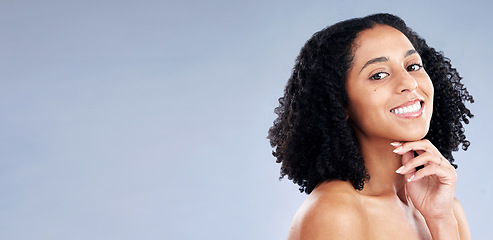 Image showing Skin, beauty and portrait of a woman in studio for dermatology, cosmetics and natural makeup. Face of happy african female model on a mockup space background for facial self care, glow and soft touch
