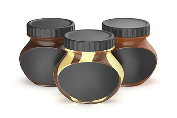 Image showing Glass jars with different chocolate creams