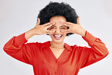 Image showing Crazy, smile and portrait of a black woman on a studio background for funny, comic and laughing. Happy, excited and a young African model or corporate employee with a hand gesture by the face