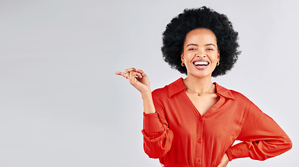 Image showing Portrait, pointing and black woman mockup, smile and promotion against a white studio background. Face, female person and model with hand gesture, showing and choice with presentation and opportunity
