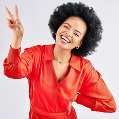 Image showing Support, peace sign and portrait of a black woman on a studio background with an emoji. Smile, funny model and an African girl or employee with a hand gesture isolated on a backdrop for comedy