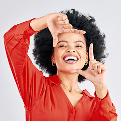 Image showing Portrait, happy black woman and finger frame in studio to review profile picture on white background. Face of female model planning perspective for photography, creative inspiration and hand sign