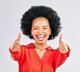 Image showing Thumbs up, happy and portrait of a businesswoman in studio with success, achievement or goal. Happiness, smile and professional African female person with an agreement hand gesture by gray background