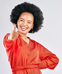 Image showing Thumbs up, smile and portrait of a businesswoman in studio with success, achievement or goal. Happiness, smile and professional African female person with an approval hand gesture by gray background.