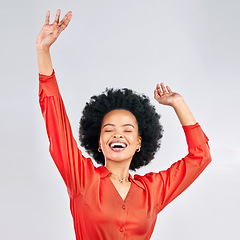 Image showing Happy black woman, afro and dancing in celebration for discount, sale or fashion against a white studio background. Excited African female person in happiness for winning, achievement or bonus promo