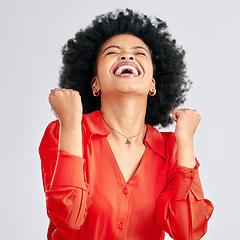 Image showing Happy black woman, winner and fist in studio for celebration, achievement and success on white background. Face of excited model celebrate winning prize, deal and victory of lottery, bonus and reward