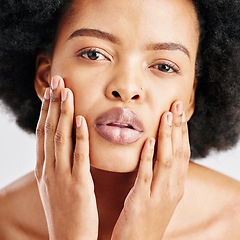 Image showing Beauty, skin care and portrait of a black woman with dermatology, cosmetics or natural makeup. Closeup and face of serious African female model in studio for facial glow, self love and soft touch