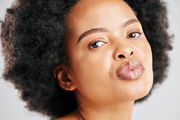 Image showing Skin care, beauty and portrait of a black woman with dermatology, cosmetics or natural makeup. Closeup and face of serious African female model in studio for facial glow, self love and afro hair