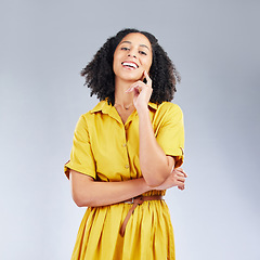 Image showing Portrait, fashion and happy with a model woman in studio on a white background for trendy style. Yellow, smile and beauty with a confident young female person with an afro posing in a clothes outfit