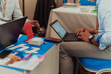 Image showing Close up of business hands are typing on laptop.